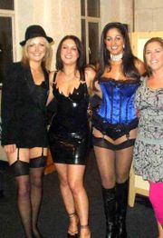 Ladies wearing stockings with suspenders